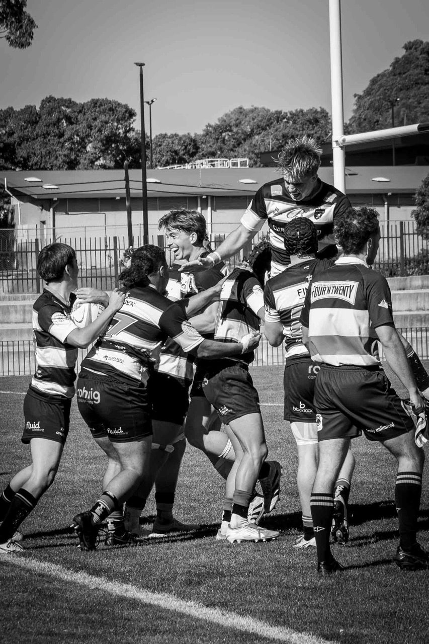 Players drive forward in a maul
